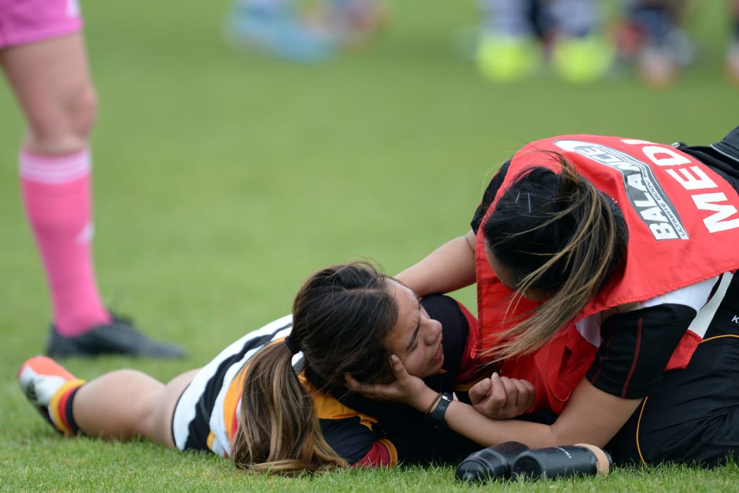 Waikato's Stacey Waaka is checked for concussion during the Women's Rugby NPC semifinal in October 2015.