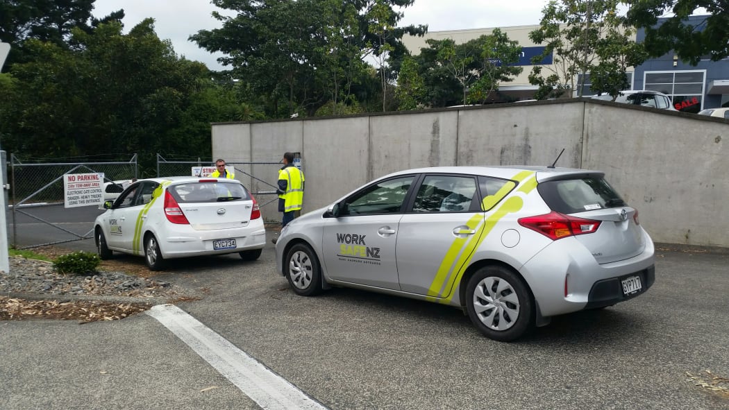 Worksafe arrive at a recycling centre where a truck driver was crushed to death.