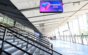 THEME PICTURE - Wiener Stadthalle on Monday, August 25, 2025 in Vienna, Austria. Vienna will host the 70th Eurovision Song Contest, with the final taking place on May 16, 2026, at the Wiener Stadthalle.    Interior view of Hall D of the Vienna City Hall, VIENNE 2026 United by Music screen - 20250825_PD10941 (Photo by HANS KLAUS TECHT / APA-PictureDesk via AFP)