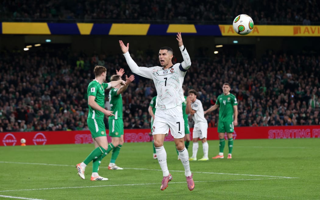 Portugal's forward Cristiano Ronaldo reacts during the men's football 2026 World Cup Group F qualifier between Ireland and Portugal at Aviva Stadium in Dublin on November 13, 2025. (Photo by Paul Faith / AFP)