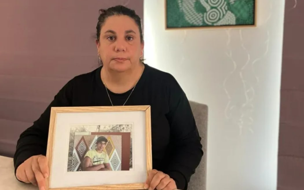 Raylene Nixon with a photo of her son Steven Nixon-McKellar