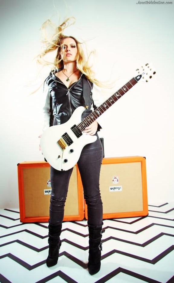 Metal and improvisation guitarist Sally Gates lives in New York City.
