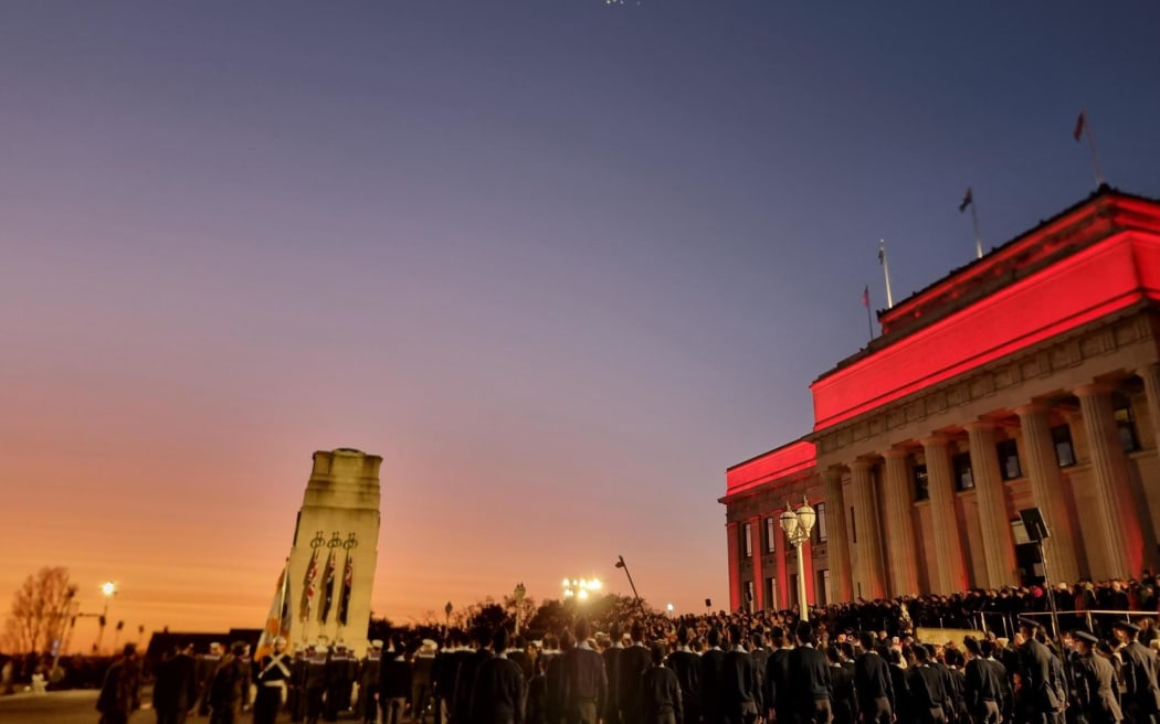 The sun rises during the Anzac Day dawn service at Auckland Domain.