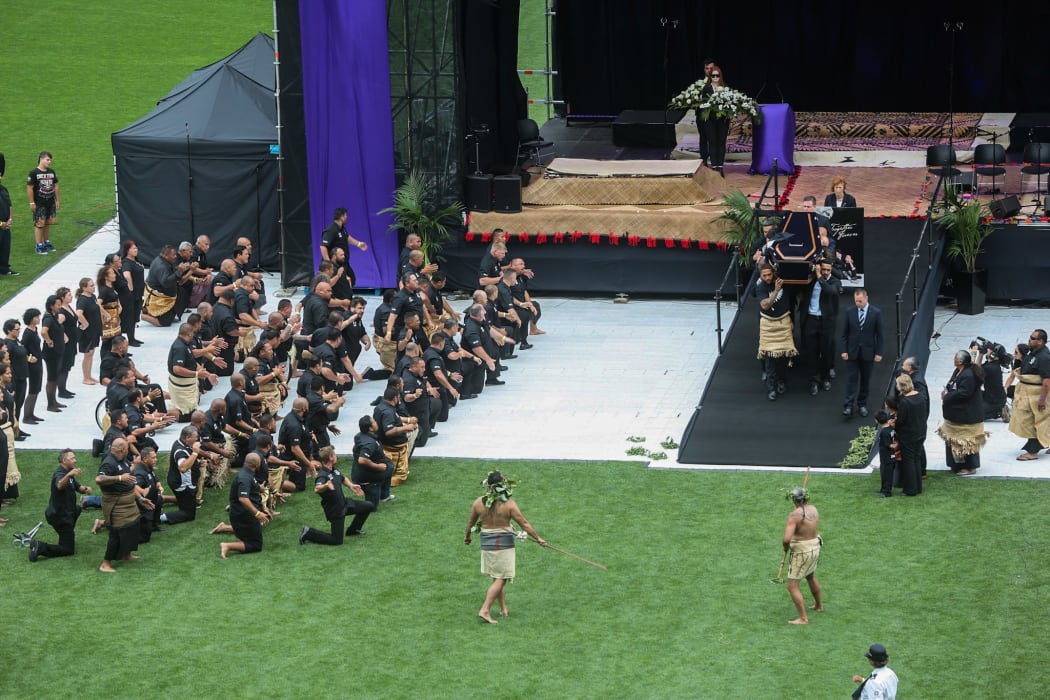 Johan Lomu's casket is carried through Eden Park