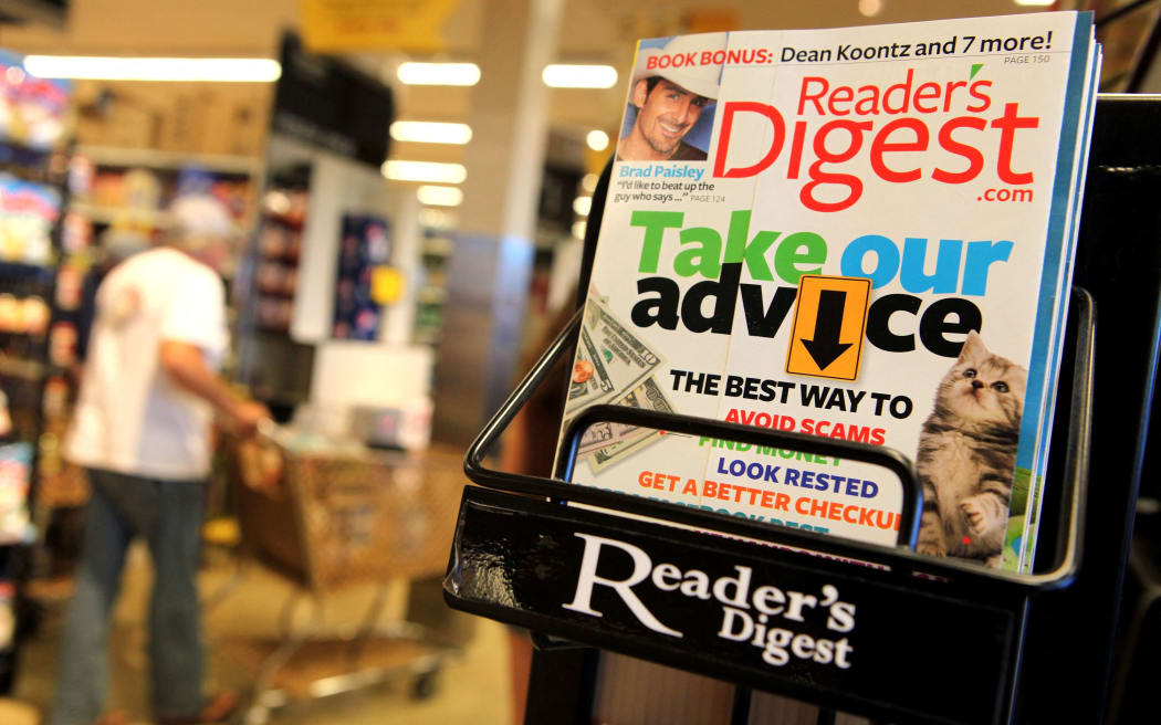 SAN ANSELMO, CA - AUGUST 17: A copy of Reader's Digest magazine is displayed on a rack at a grocery store August 17, 2009 in San Anselmo, California. Citing weak advertising revenue, the publisher of Reader's Digest announced today that it will file a pre-arranged Chapter 11 bankruptcy and plans to swap nearly $1.6 billion in debt for partial ownership of the company.   Justin Sullivan/Getty Images/AFP (Photo by JUSTIN SULLIVAN / GETTY IMAGES NORTH AMERICA / Getty Images via AFP)