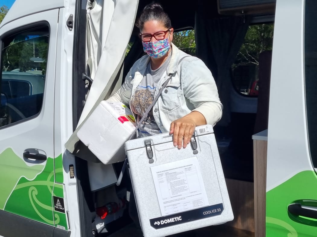 Registered nurse Melissa Nikora gets ready for the Covid-19 vaccination clinic at the Pongaroa Hotel on Friday 19 November, 2021.