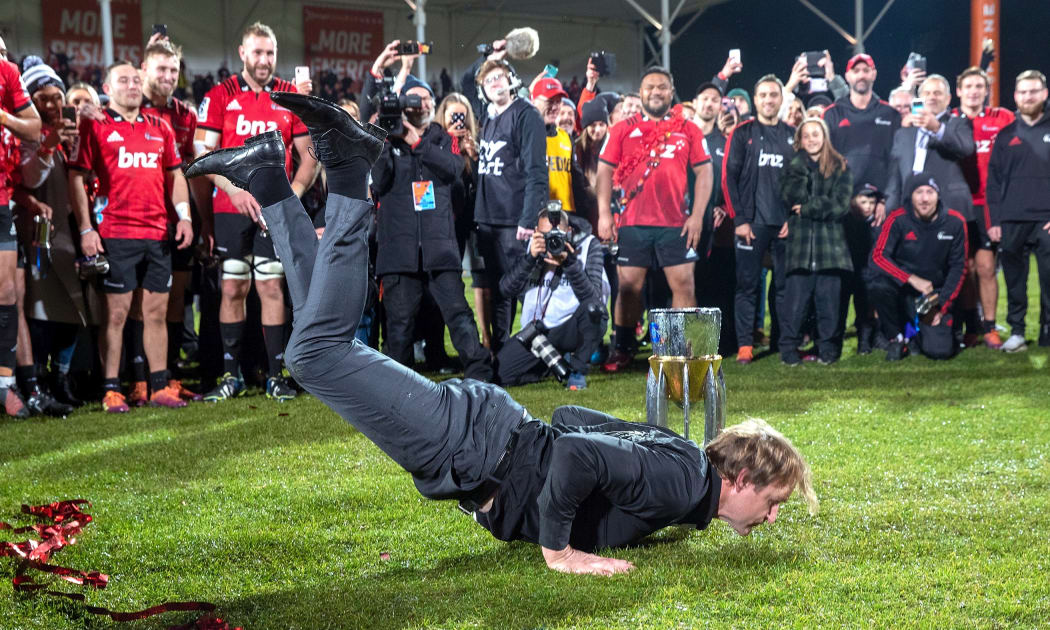 Crusaders coach Scott Robertson displays his trademark breakdancing routine after the Crusaders' 19-3 win over the Jaguares in the Super Rugby final.