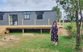 Jane Kay simply wanted to place her transportable tiny home in her daughter’s backyard, but has had to jump through hoops to make it compliant with Whakatāne District Council rules.