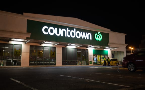 Police standing guard outside the Cumberland Street Countdown in Dunedin on Tuesday night after four people were stabbed there in an attack that afternoon.