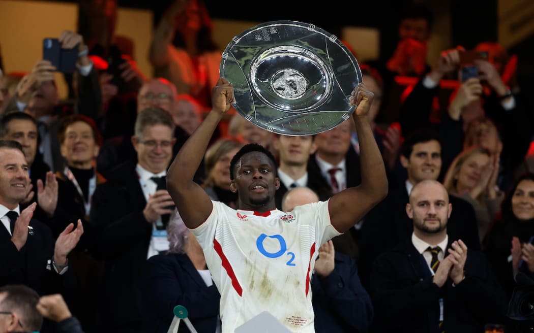 Maro Itoje of England lifts the Hilary Shield. England v All Blacks at Twickenham Stadium, 2025.