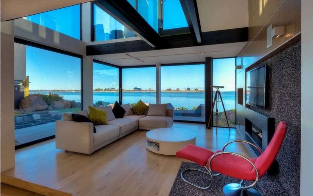 The luxury house at Redcliffs. Owner Pavlos Van Aalst and insurer IAG are in dispute over the rebuild cost.