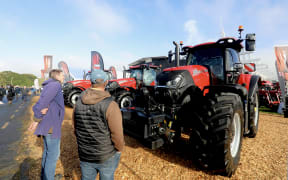 Fieldays attendees scoping the tractors at Fieldays.