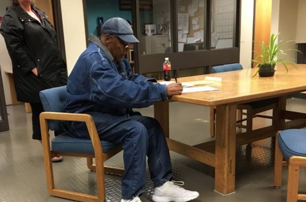 OJ Simpson signed release documents before walking out of a Nevada jail just after midnight, local time
