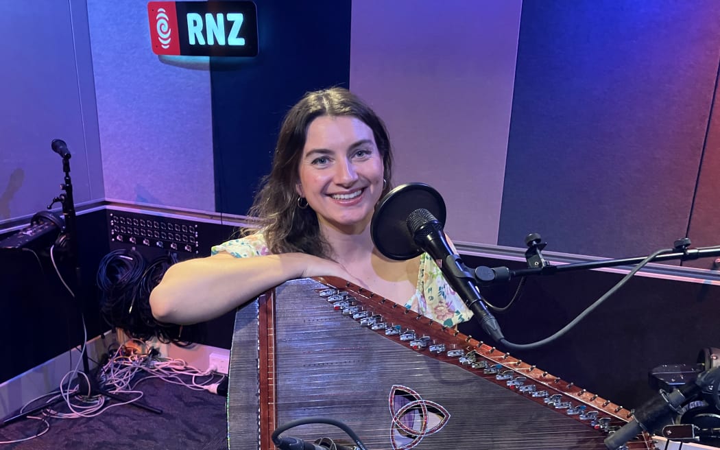 Lithuanian musician Simona Smirnova in the RNZ Auckland studio with her kanklės.