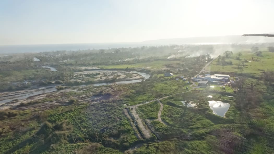 Looking over Mele Village outside of Port Vila, the river on the left burst its banks during the cyclone floodng the entire village and destroying all their food gardens.