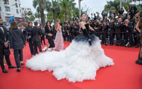 France, Cannes, 2024-05-14. Qian Hui on the red carpet for the opening night of the 77th Cannes Film Festival, with the out-of-competition film Le deuxieme acte of Quentin Dupieux. . Photograph by Roland MACRI / Hans Lucas.
France, Cannes, 2024-05-14. Qian Hui sur le tapis rouge de la soiree d ouverture du 77me Festival de Cannes, avec le film hors competition Le deuxieme acte
de Quentin Dupieux. . Photographie de Roland MACRI / Hans Lucas. (Photo by Roland Macri / Hans Lucas / Hans Lucas via AFP)