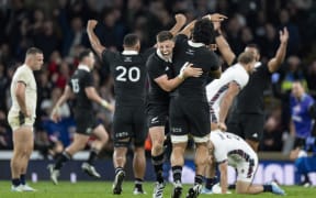 All Blacks Cam Roigard and Wallace Sititi celebrate at full-time after George Ford of England misses a drop goal attempt at the final whistle during All Blacks v England.