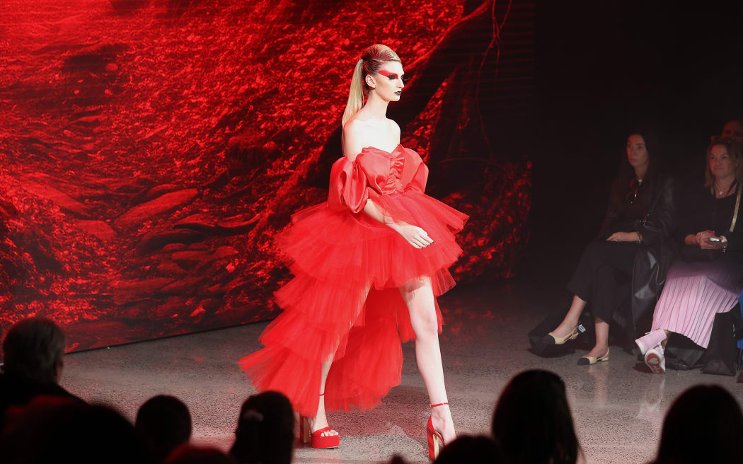 AUCKLAND, NEW ZEALAND - AUGUST 29: A model walks the runway during the Jacqueline Anne show during New Zealand Fashion Week 23: Kahuria at Viaduct Events Centre‎ on August 29, 2023 in Auckland, New Zealand.