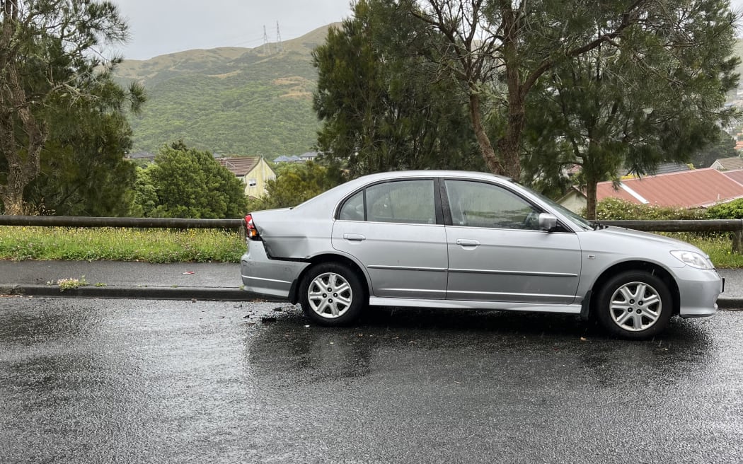 Laura Nalder's parked car was hit by a passing bus in Churton Park, Welli.gton