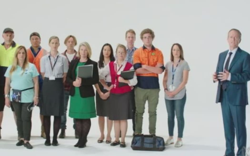 A screenshot from the campaign video shows Labor leader Bill Shorten with a group of mainly white Australians.
