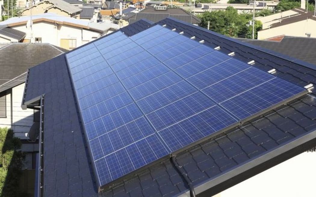 Solar panel on house roof.