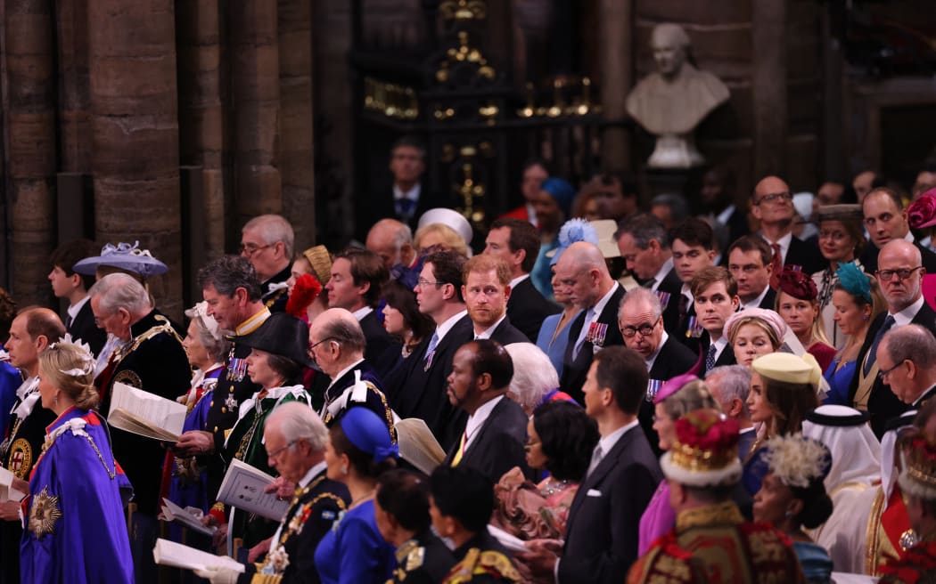 Britain's Prince Harry, Duke of Sussex (center) attends the coronations of Britain's King Charles III and Britain's Camilla, Queen Consort, at Westminster Abbey in central London on May 6, 2023. - The set-piece coronation is the first in Britain in 70 years, and only the second in history to be televised. Charles will be the 40th reigning monarch to be crowned at the central London church since King William I in 1066. Outside the UK, he is also king of 14 other Commonwealth countries, including Australia, Canada and New Zealand. Camilla, his second wife, will be crowned queen alongside him, and be known as Queen Camilla after the ceremony. (Photo by Richard POHLE / POOL / AFP)