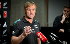 Scott Robertson speaks to media.