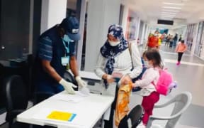 Covid-19 health screening at the Jackson International Airport in Port Moresby.