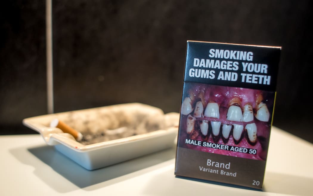 Illustration of a neutral cigarette packet, in Paris, on September 8, 2015. French government wants to reintroduce neutral cigarette packaging in his new draft Health law.