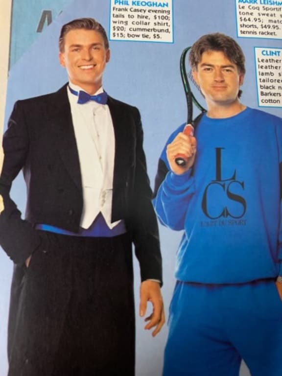 A photo of a style page in a 90s magazine. Phil and Mark are photographed side by side, Phil in a suit and tails with navy bowtie, and Mark in a blue athletic sweatsuit, carrying a tennis racket.