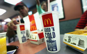 A customer eats with a 21 ounce cups of soda at a Manhattan McDonalds on September 13, 2012 in New York City.