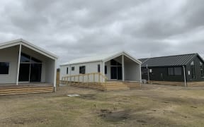 The 11 homes were delivered under the Ministry of Business, Innovation and Employment's Temporary Accomodation Service - in partnership with the marae and Ngāti Kahungunu Iwi Incorporated.