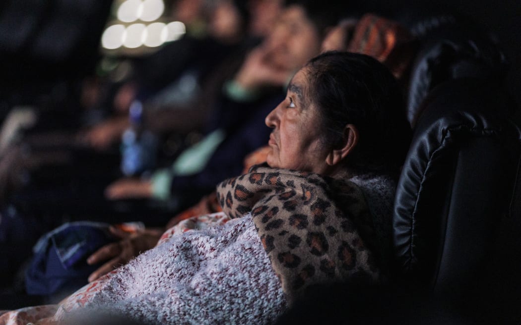 An audience is watching the documentary, June 18.