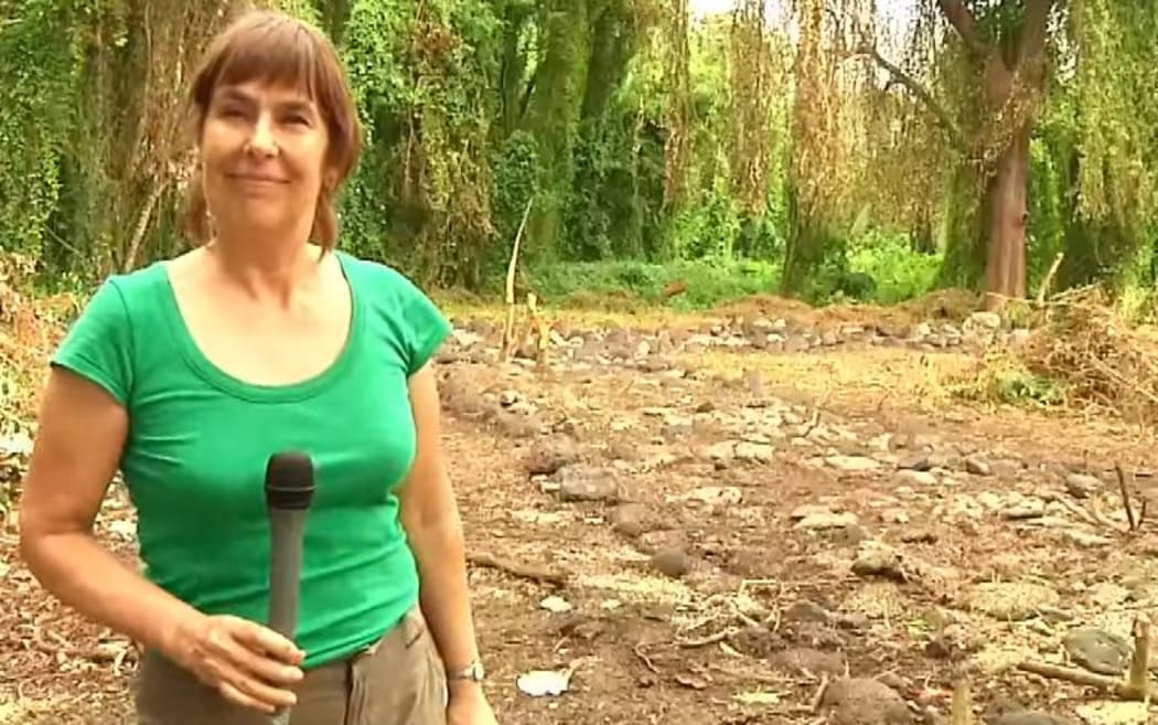 Jane Downes next to the paepae.