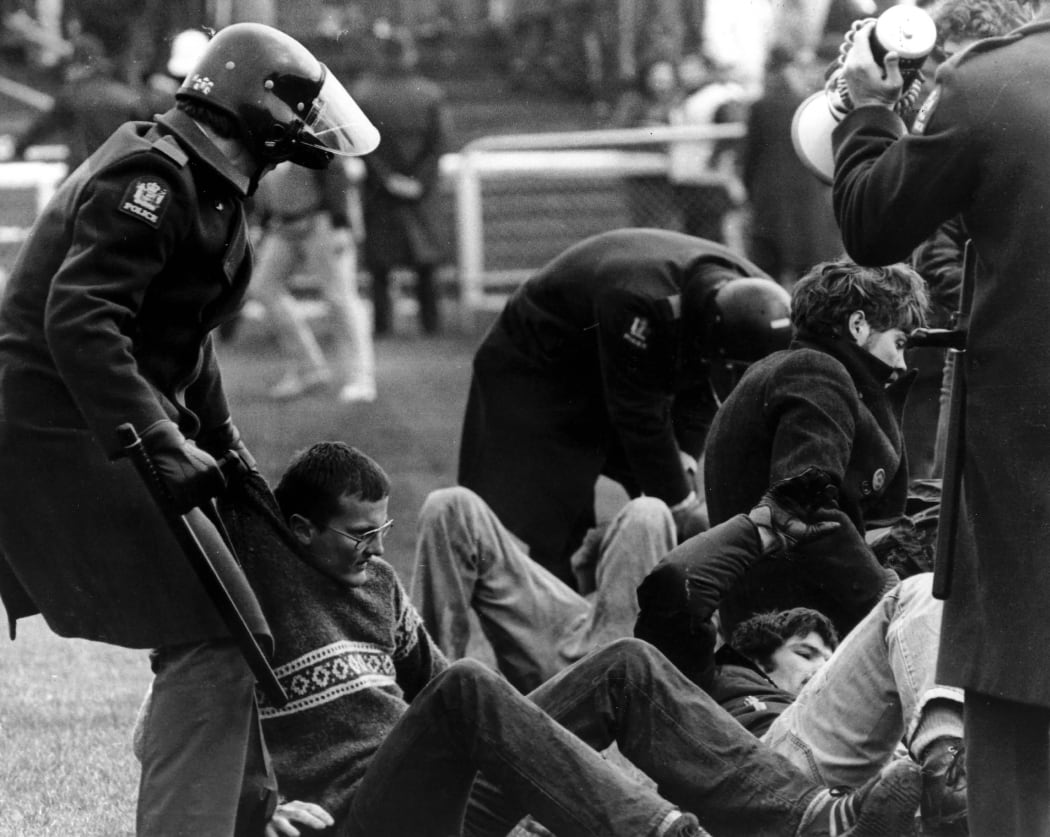 Protestors interrupt the New Zealand v South Africa Rugby Match in 1981.
