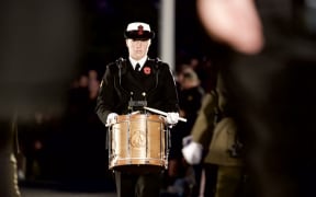 A band member plays at the dawn service in Auckland