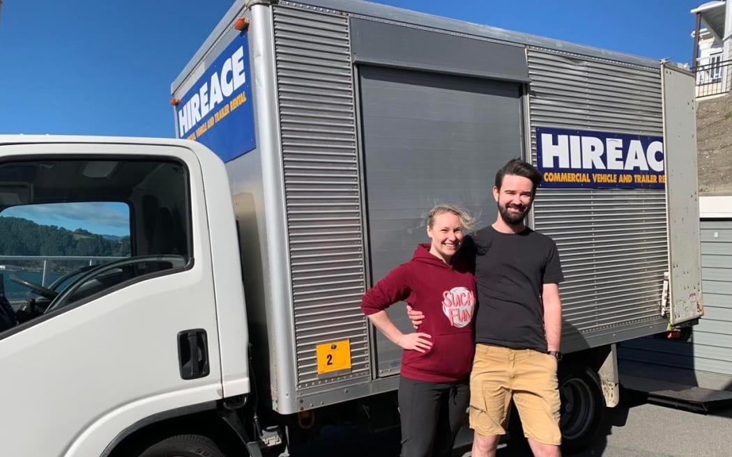 Tim and his partner Jo on moving day in 2022.