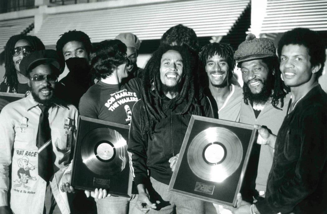 Bob Marley and the Wailers with their Gold Discs for NZ record sales
