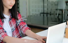 girl teenager college high school student studying with computer laptop