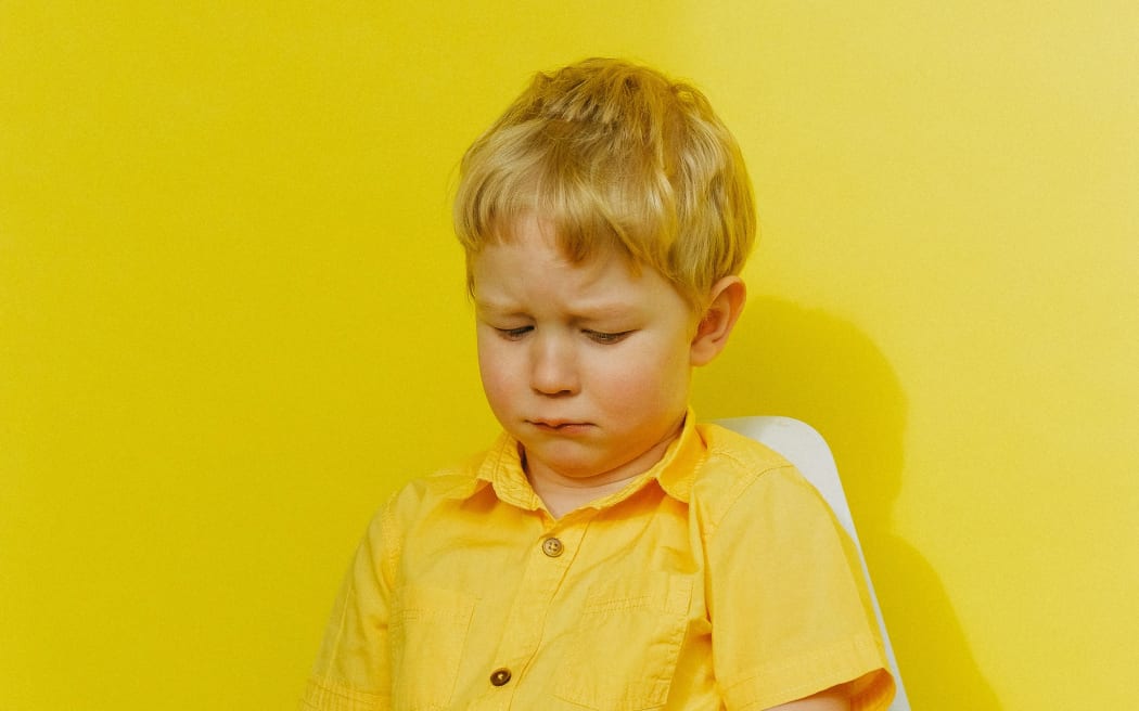 sad blonde boy
