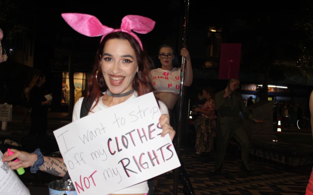 A protester makes her point outside Calendar Girls Wellington.