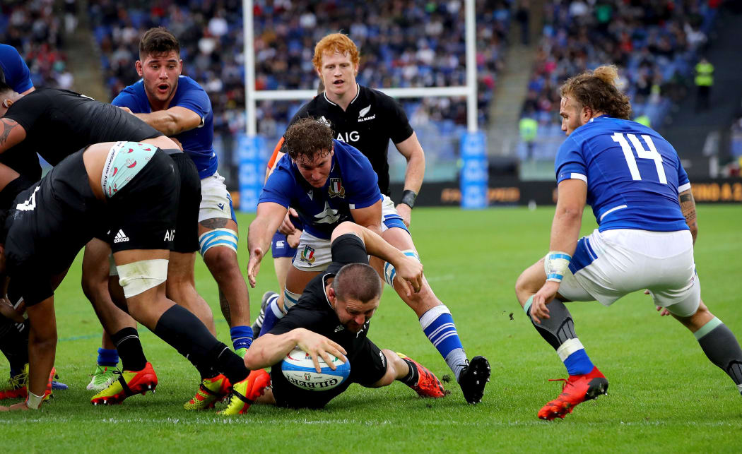 All Blacks hooker Dane Coles scores against Italy in Rome.