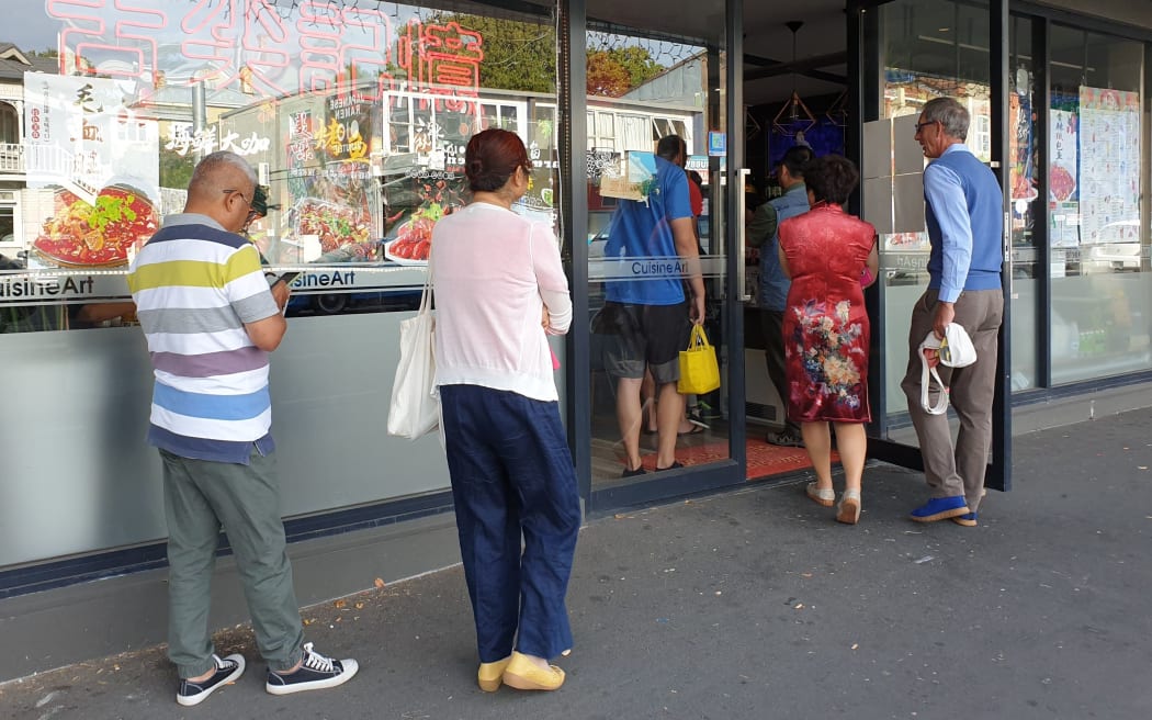 Chinese New Year's Eve 

People queue at Cuisine Art on Dominion Road, Auckland