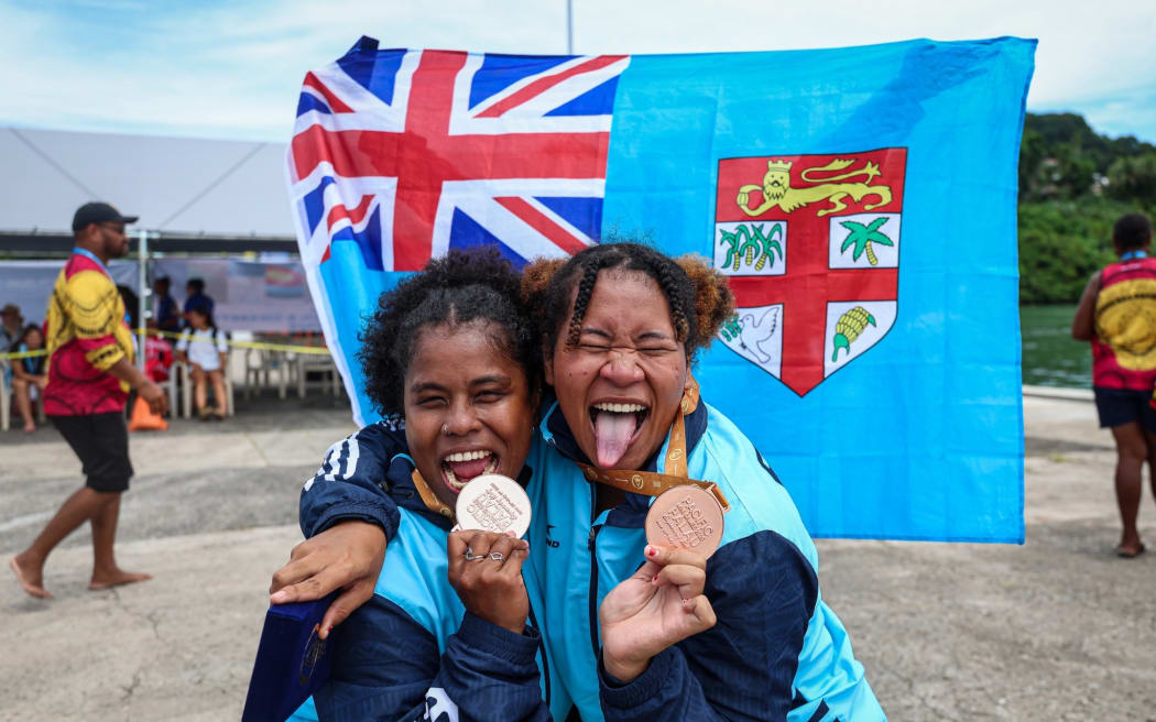 Team Fiji athletes with their spoils in the V12 500-meter competition. 30 June 2025