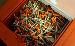 Used syringes at a needle exchange clinic in the US, where users can pick up new syringes and other clean items for those dependent on heroin (file photo)