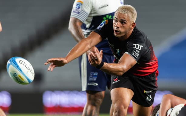 Crusaders halfback Noah Hotham in action against the Blues.