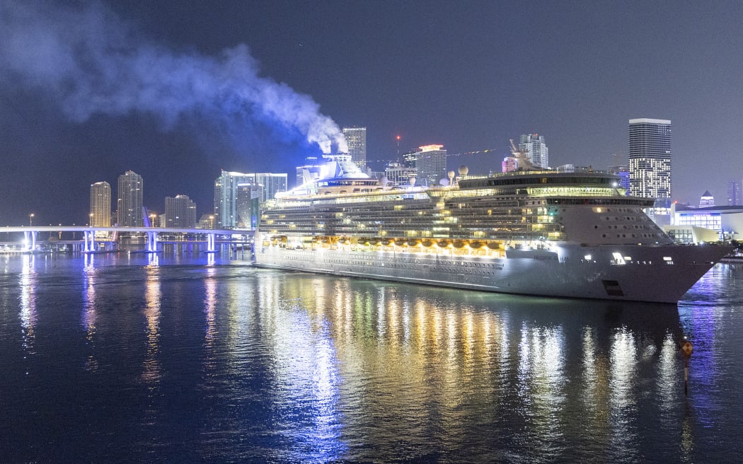 Cruise ship with smoke billowing arrives in Miami