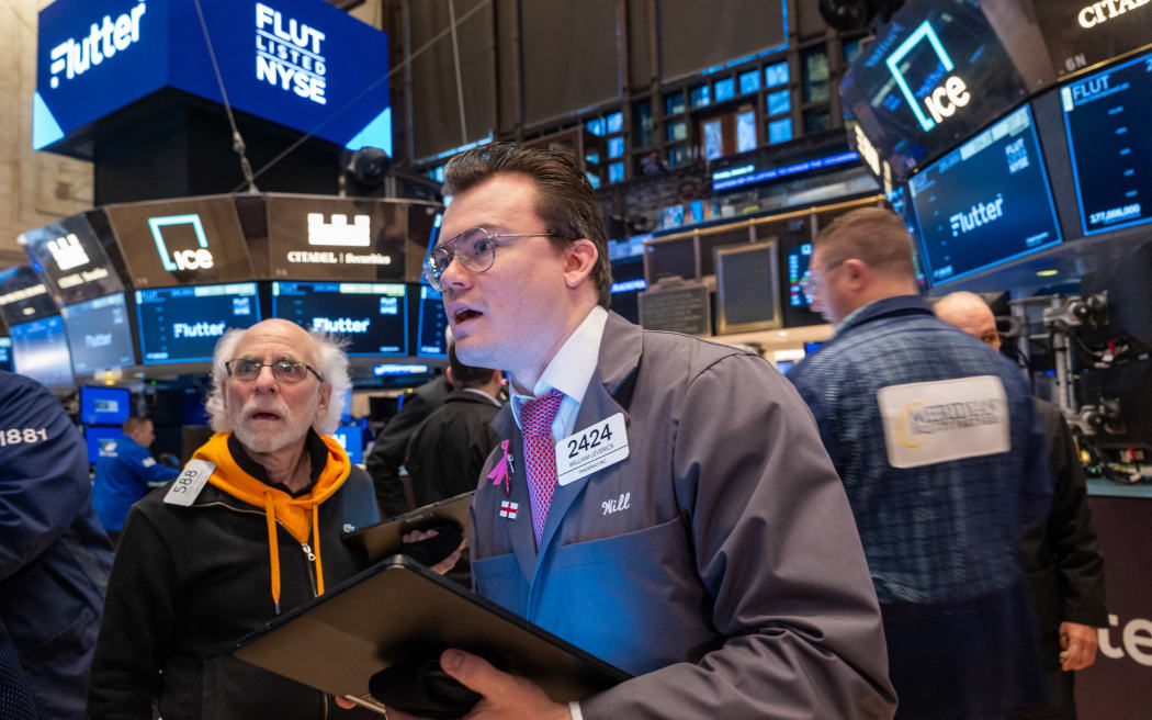Traders work on the floor of the New York Stock Exchange (NYSE) on January 29, 2024 in New York City. Wall Street observers are watching to see if an upcoming Fed announcement on rate policy and the most recent violence in the Middle East will have any effect on the markets.   Spencer Platt/Getty Images/AFP (Photo by SPENCER PLATT / GETTY IMAGES NORTH AMERICA / Getty Images via AFP)