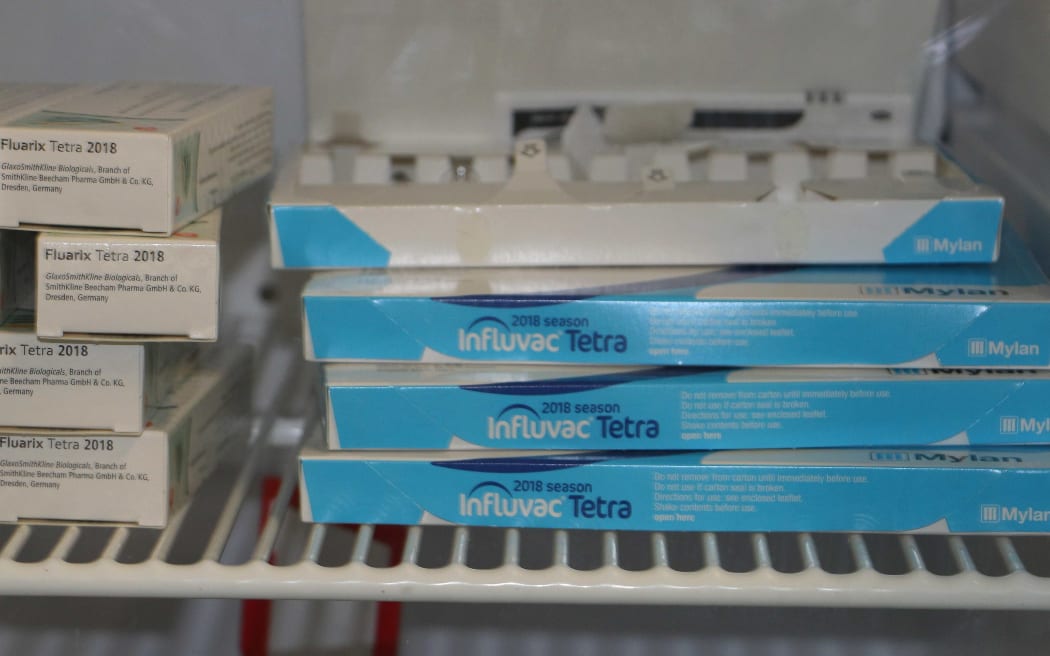 Boxes of flu vaccination in fridge
