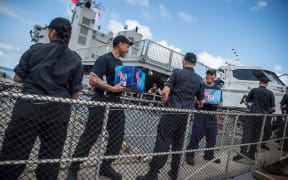 HMNZS Wellington being loaded with aid in Fiji post Cylone Winston